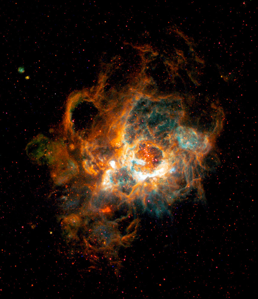Σύννεφα  αερίου στο νεφέλωμα NGC 604 του γαλαξία Μ33. Στο κέντρο βρίσκονται πάνω από 200 αστέρια, 15 με 60 φορές μεγαλύτερα απ'τον Ήλιο (γενικά ο Ήλιος δεν είναι και τίποτα τρελό, απλά το'χουμε κάνει θέμα επειδή μας δίνει το δώρο της Ζωής