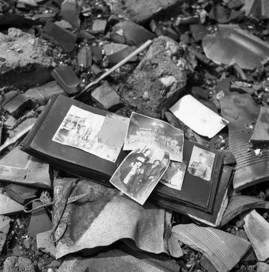 Not published in LIFE. A photo album, pieces of pottery, a pair of scissors Ñ shards of life strewn on the ground in Nagasaki, 1945.