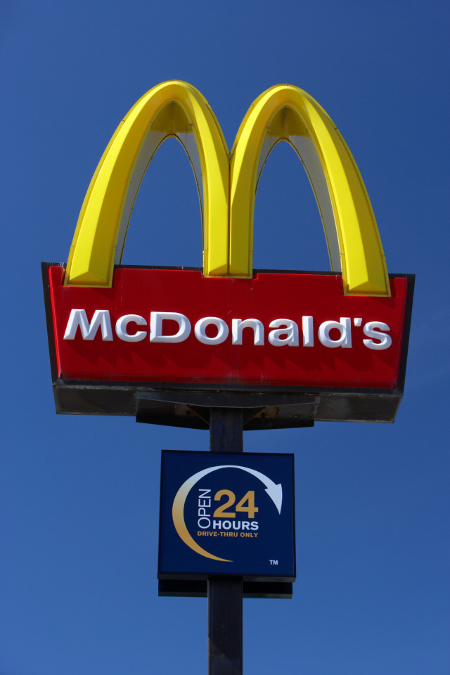 BMEDC4 golden arches sign at mcdonalds drive through fast food restaurant merseyside england uk