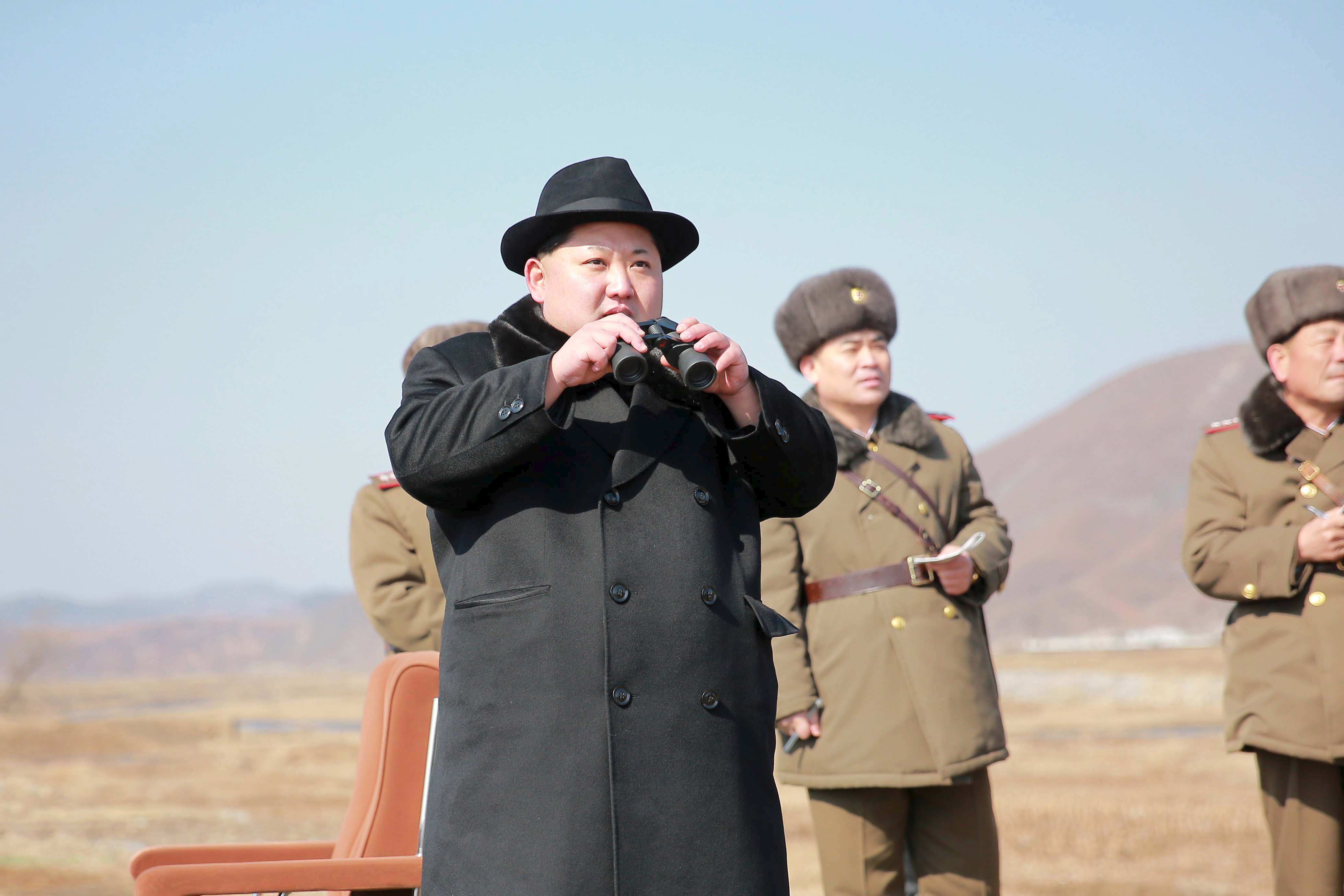 North Korean leader Kim Jong Un inspects a flight drill of fighter pilots from the Korean People's Army's (KPA) Air and Anti-Air Force, in this undated photo released by North Korea's Korean Central News Agency (KCNA) in Pyongyang on February 21, 2016. REUTERS/KCNA ATTENTION EDITORS - THIS PICTURE WAS PROVIDED BY A THIRD PARTY. REUTERS IS UNABLE TO INDEPENDENTLY VERIFY THE AUTHENTICITY, CONTENT, LOCATION OR DATE OF THIS IMAGE. FOR EDITORIAL USE ONLY. NOT FOR SALE FOR MARKETING OR ADVERTISING CAMPAIGNS. THIS PICTURE IS DISTRIBUTED EXACTLY AS RECEIVED BY REUTERS, AS A SERVICE TO CLIENTS. NO THIRD PARTY SALES. SOUTH KOREA OUT. NO COMMERCIAL OR EDITORIAL SALES IN SOUTH KOREA. - RTX27VMH