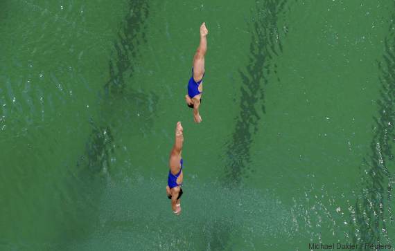 2016 Rio Olympics - Diving - Final - Women's Synchronised 10m Platform - Maria Lenk Aquatics Centre - Rio de Janeiro, Brazil - 09/08/2016. Kuk Hyang Kim (PRK) of North Korea and Kim Mi Rae (PRK) of North Korea compete. REUTERS/Michael Dalder FOR EDITORIAL USE ONLY. NOT FOR SALE FOR MARKETING OR ADVERTISING CAMPAIGNS.