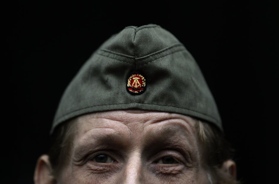 A man dressed as a NVA officer watches participants of the 'reality event' one night at the 'Bunker-Museum' in Rennsteighoehe near the eastern city of Ilmenau