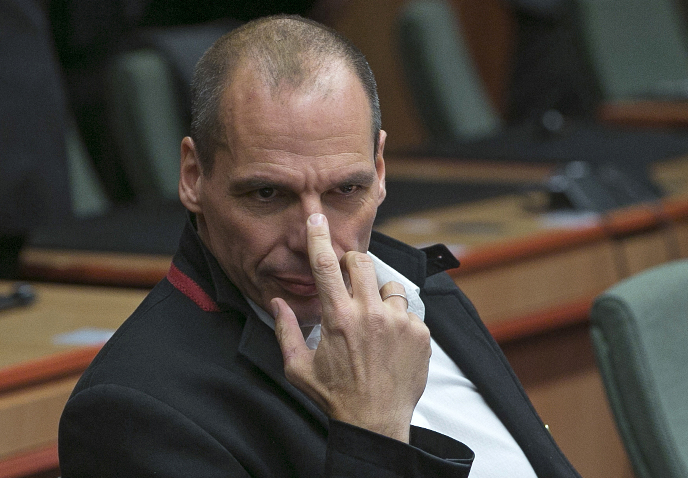 Greek Finance Minister Yanis Varoufakis waits for the start of an extraordinary euro zone Finance Ministers meeting (Eurogroup) to discuss Athens' plans to reverse austerity measures agreed as part of its bailout, in Brussels February 20, 2015. Greece has made every effort to reach a mutually beneficial agreement with its euro zone partners but will not be pushed to implement its old bailout programme, its government spokesman said on Friday.  REUTERS/Yves Herman (BELGIUM - Tags: POLITICS BUSINESS TPX IMAGES OF THE DAY) - RTR4QGAY
