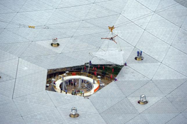 The last panel of China's world largest radio telescope named "FAST", is installed in Pingtang county, Guizhou Province, China, July 3, 2016. China Daily/via REUTERS